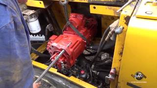 How to Install a Hydraulic Pump on an Excavator [upl. by Heilner742]