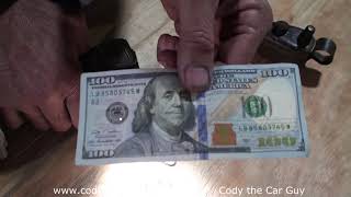 How to spot a fake 100 dollar bill [upl. by Yahsed67]