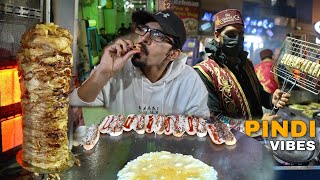 PINDI STREET FOOD IN PAKISTAN  Mamoo Burger Majeed Nihari amp BABA Karahi [upl. by Anyer]