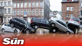 Belgium floods  Torrent of floodwater washes away cars [upl. by Akemrej]